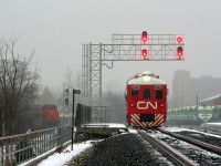Observed from near the Duke Street crossing, everything is at a stand still at Kitchener West on the Guelph Subdivision. Basically, CN RDC 1501 needed to get on the Huron Park Spur and CN L540, seen to the left, needed to get off it. After some time and precise movements, everything came together and CN Track Evaluation RDC 1501 would eventually head down the Huron Park Spur with several railfan's in pursuit. 