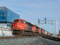 Things were a little slow during the strike, so a sunny day brought me to locales I tend to otherwise not frequent. After a couple quick catches closer to home, shooting <a href="http://www.railpictures.ca/?attachment_id=39570" target="_blank">TH21 in Hamilton</a> and <a href="http://www.railpictures.ca/?attachment_id=39549">148 in Copetown</a>, I ventured up to Cambridge where I shot T72 and T97, then it was off to Kitchener where there was word of four 4-axle units on 568. Here, rolling through Kitchener West, they had just begun their journey west to Stratford after working Kitchener yard for a bit. I chased them there and got some shots of them working both ends of the yard in Stratford. 2434 (trailing in fourth in this shot) led on the return trip east, and was one of the more sickly sounding units I've ever heard. With the barns going into storage, I partly wonder if it's the last time I'll ever see one on point for CN. Shots of it to follow one day, I am sure.