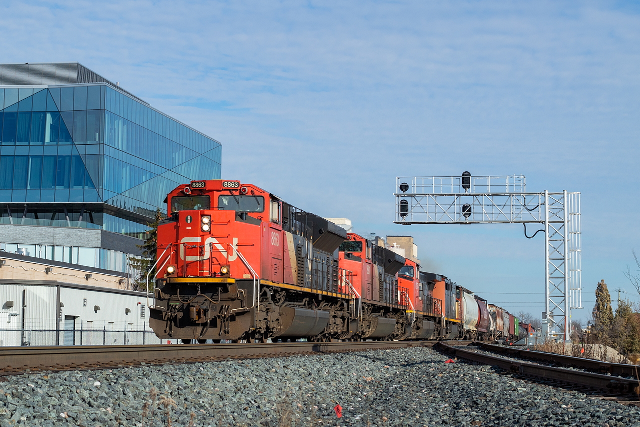 Things were a little slow during the strike, so a sunny day brought me to locales I tend to otherwise not frequent. After a couple quick catches closer to home, shooting TH21 in Hamilton and 148 in Copetown, I ventured up to Cambridge where I shot T72 and T97, then it was off to Kitchener where there was word of four 4-axle units on 568. Here, rolling through Kitchener West, they had just begun their journey west to Stratford after working Kitchener yard for a bit. I chased them there and got some shots of them working both ends of the yard in Stratford. 2434 (trailing in fourth in this shot) led on the return trip east, and was one of the more sickly sounding units I've ever heard. With the barns going into storage, I partly wonder if it's the last time I'll ever see one on point for CN. Shots of it to follow one day, I am sure.