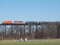 Not an original or imaginative shot by any means, but one of those ones that if you can do, you should do at least once. Here, the St. Thomas job stretches onto the old Wabash bridge over Athletic Park as they sort through cars from CN. Lots of traffic for OSR in the yard lately, mostly LPG.