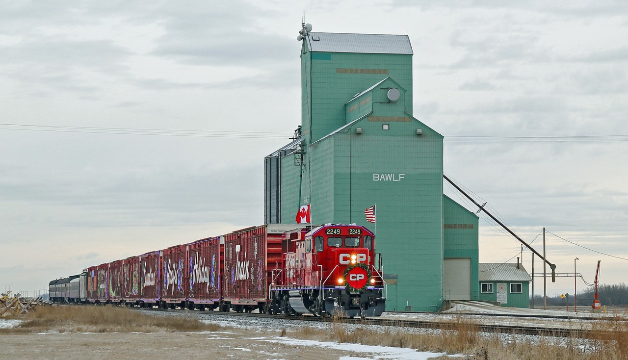 The CP Holiday train heads west through Bawlf en route to Wetaskiwin for it's first performance stop of the day.