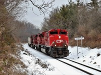 I was sitting in my usual spot waiting for an early CP 140 when my phone rang. Mr. Host informed me that CP 246 had a rebuilt CP 7006 leading. Well every other effort to get one of these rebuilds has ended up broke down, or trailing, so off I went to Guelph Junction. I shot CP 140 so I sat wondering where to get the CP 246 and I recalled looking at Arnold's picture earlier in the day. A few things changed with the "Guelph Junction" sign replaced by the "Campbellville" sign, the trees and foliage are a little higher and grown in and there are gates on the crossing just behind me but the spot is a very good shooting location.CP 7006 with CP 3063 and CP 8608 pour the power on as they head south down the Hamilton sub for a stop at Kinnear.