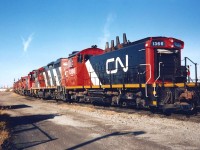 On the same day the Toronto Blue Jays won their second World Series title, the shop track in London had quite a line-up of four-axle power. It included; SW1200RS 1366, GP9RM 4141, SW1200RS 1361, SW1200RS 1360, GP9RM's 4130 and 4110 as well as GP9RM 4104. Both 1361 and 1366 had been freshly painted in the railway's CNNA colors at the time.