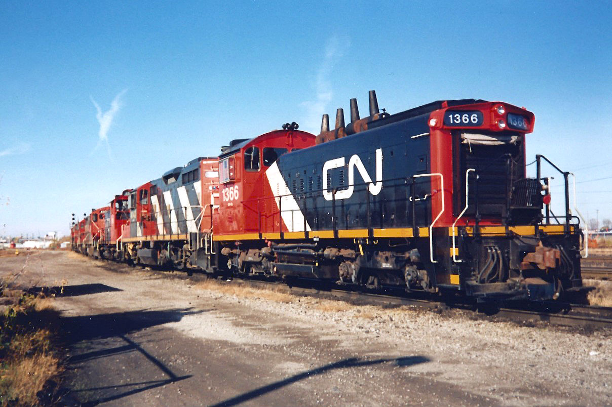 On the same day the Toronto Blue Jays won their second World Series title, the shop track in London had quite a line-up of four-axle power. It included; SW1200RS 1366, GP9RM 4141, SW1200RS 1361, SW1200RS 1360, GP9RM's 4130 and 4110 as well as GP9RM 4104. Both 1361 and 1366 had been freshly painted in the railway's CNNA colors at the time.