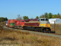 CP 7015 leads train 100 for the first time across our great Nation in "block" lettering, over 3000 miles from Vancouver to Toronto and only about 50 miles to go on its transcontinental journey. The day before 7010 led in "script" lettering, and was the first ever to lead on the Transcontinental mainline into Toronto. With the addition of the "military" units and the 8 more "maroon" heritage SD70's yet to come, it's going to be busy with photographers on the CP mainline for the foreseeable future. Thanks to the folks at CP who made it possible, you know who you are and we're all smiles because of it :) Looking forward to everyone's photos, so far it has been a great show! <br><br>Shouts out to John Spring and <a href=http://www.railpictures.ca/author/lock4244 target=_blank> Mike Lockwood</a> who were shooting with me at this spot.