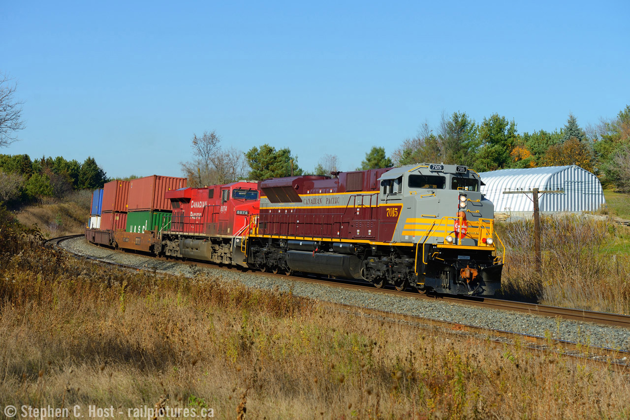 CP 7015 leads train 100 for the first time across our great Nation in "block" lettering, over 3000 miles from Vancouver to Toronto and only about 50 miles to go on its transcontinental journey. The day before 7010 led in "script" lettering, and was the first ever to lead on the Transcontinental mainline into Toronto. With the addition of the "military" units and the 8 more "maroon" heritage SD70's yet to come, it's going to be busy with photographers on the CP mainline for the foreseeable future. Thanks to the folks at CP who made it possible, you know who you are and we're all smiles because of it :) Looking forward to everyone's photos, so far it has been a great show! 
Shouts out to John Spring and  Mike Lockwood who were shooting with me at this spot.