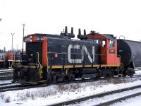 CN CS-02 switches a cut of cars outside of the car shop in Walker Yard.  I believe this was CN's attempt to reduce maintenance on a locomotive by classifying it as car shop equipment.  I don't think it lasted too long.  I had thought it was ex. CN 1272 but the Trackside Guide says 1272 was retired in 1995 and sold to Canac so I doubt CS-02 is that unit, unless it sat in storage and/or was CS-02 for years.  