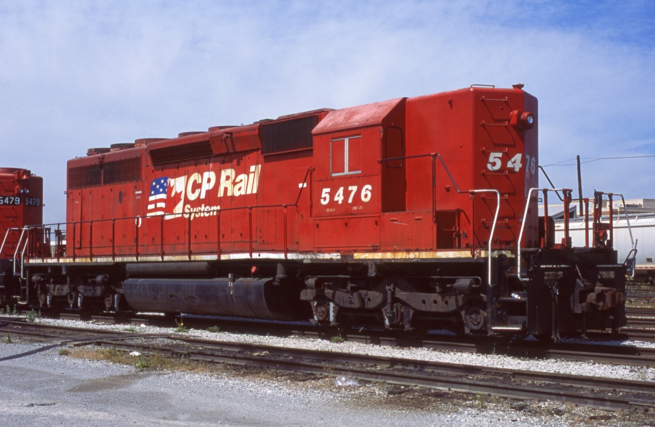 Retired 5476 sits towards the east end of Agincourt yard. The unit started out as Southern 3250, then became NS,GATX, and CP 3250 before being renumbered CP 5476. Shortly after this picture was taken it was sold to NREX and was leased to, ironically, NS.