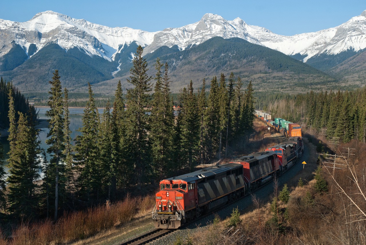 CN 106 rounds the bend at Brule Alberta on a lovely spring morning. The nice set of Draper Tapers up front had just been pulled off of a coal train after the 2567 suffered a mechanical failure.