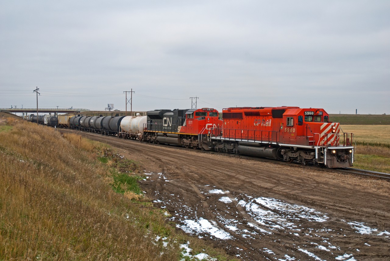 Sutherland(Saskatoon)-Winnipeg train 454 had a fine set of GM units on this cloudy October day. I had to do a double take at this set of power as I drove by the yard.