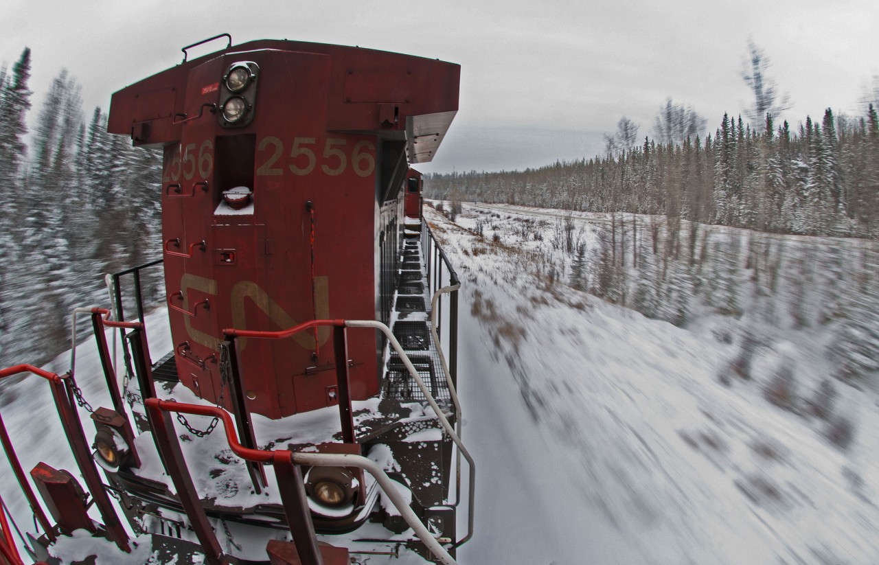 Dash(9)-ing through the snow!  CN 479 is only 40 miles into its 250 mile journey to Fort Nelson as it nears Blue Hills.