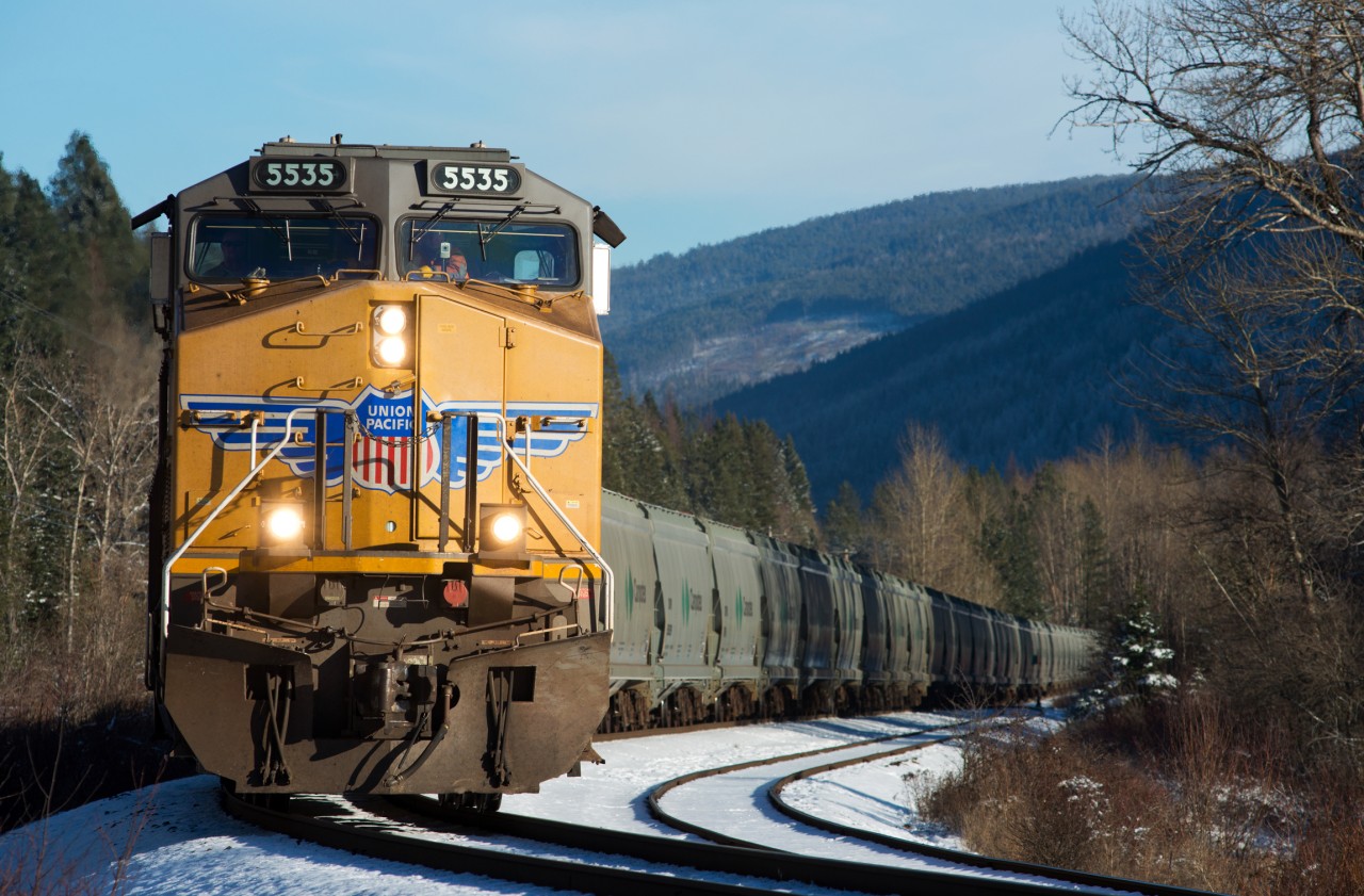 UP 5535 West has just passed the east switch at Tochty on the Cranbrook Sub. When it gets to the west switch the crew will reposition the mid-train DPU to the tail end making the train a 2x2 instead of a 2x1x1. All the potash trains seemed to to this during the couple months I was in the area.