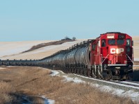 CP N61 is snowy making its way down the jointed rails of the Macklin Subdivision with 96 empties to be loaded with oil. Not a bad way to start 2020. 