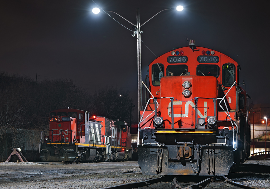 It's the end of the shift and 555's power now sit's on the backlead at Hamilton Yard waiting for the 0600 Yard assignment to take over as another set of power idles away in the oil siding.