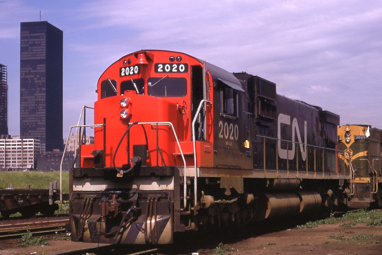 As the year 2020 opens, I thought it would be interesting to see if I had an image of a Canadian National locomotive with the same number.  Sure enough, I found this shot of the C-630M at Spadina engine house that I took in June 1968.  That summer I was working with the Ontario Government as a summer student based in Toronto.  I boarded with my grandparents, Robert and Ruby Yates at 113 Benson Avenue.  I recall that it was a great summer as I travelled for work in a new '68 Rambler during the week and with friends on weekends.  We visited Detroit, Cleveland, Philadelphia, Vermont and many locations in between that summer.  In September my friend Doug Campbell and I drove to Victoria in his '68 Volvo 142 photographing all along the way. From Calgary west, we were in the capable hands of Bob Loat. In October, Terry Thompson drove Ted Wickson and me to St. John's in his new 'VW.  It was the first year that I would photograph trains in all ten provinces.  

Thanks to Pierre Fournier for the fun idea.