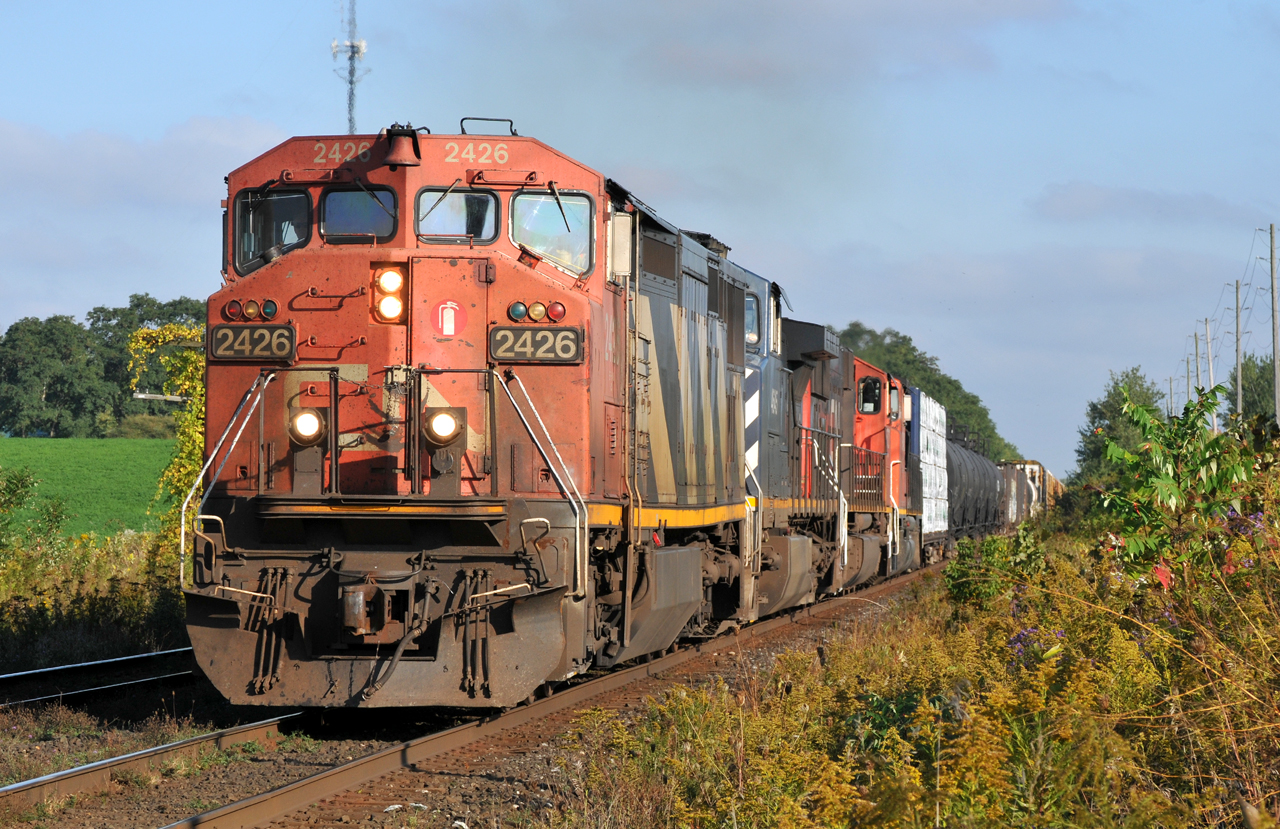 Having completed their switching at Brantford, CN A43531 30 heads for London with CN 2426, BCOL 4645, CN 5727, CN 9482, and 78 cars.
