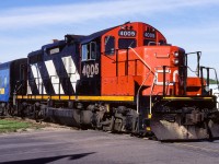 The "Last Train Through the Fort" ceremony was advertised in our local papers for Sept.8th/87. An event I was not going to miss. Here is CN 4005 parked at the Fort station with VIA coach 5474 and CN business car 93. After all the dignitaries and CN officials are boarded, they will head east to the new bridge over the North Sask. river and officially open the new rail by-pass.