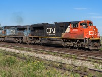 A couple of interesting units are heading up an eastbound IM. Nifty road number on the lead unit, the second is the exLMS (IC) unit 2459. The CN painted box behind the cab always puts a smile on my face, same with the noodle, it looks like it was hand painted. The summer of 2018 had a real variety of units going by every day. 2019 was much less so and I expect that this summer will be even less eventful with the arrival of so many new GE's. Photo taken at mile 259 at 10:00.