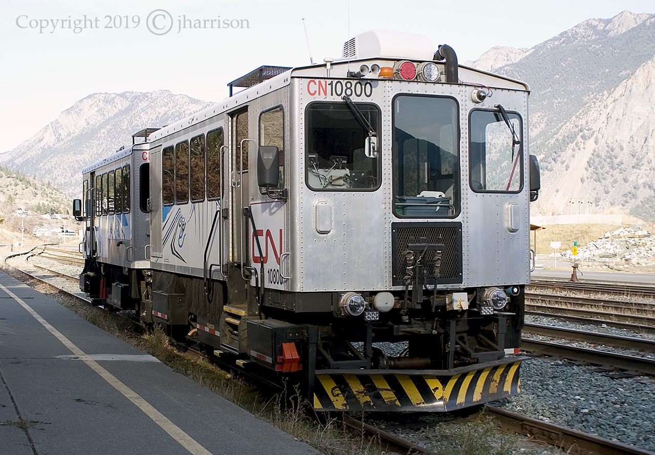 Another shot of the Kaoham Shuttle consisting of CN 10800 (ex BCOL TU-108) and CN 10900 (ex BCOL TU-109) built by Jim Busby Services in 1999 and purchased by BC Rail in 2002. The units were upgraded I believe, in 2012, with among other things, washrooms, air conditioning, improved heating and bike racks. Today, the shuttle is sharing the station siding with several BCOL wood chip cars - a sign of modern times, and at the scheduled 1530 hr. departure time, will back away from the station and onto the mainline before proceeding south to Shalalth and Seton Portage.