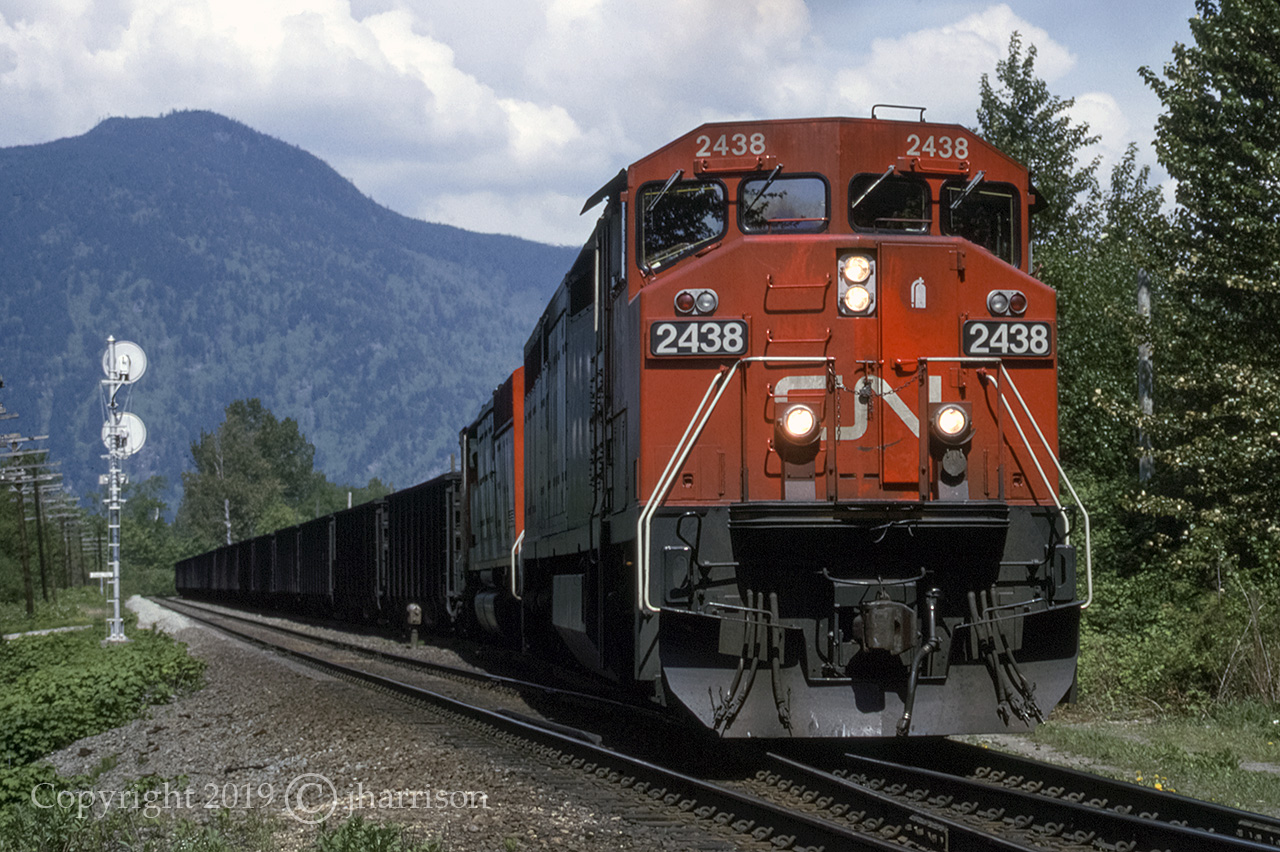 CN 2438 with the 5449 trailing are westbound at Cheam View on CNs Yale Sub. GPS is approximate.