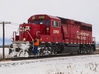 Nearly two years ago, a chilly reminder of a hardworking individual who appears to have no weakness to the harsh climates of winter in Southwestern Ontario. Here, 2292 finishes switching and looks extraordinarily colourful against the cold white surroundings as the windchill this day sure felt mightily frigid.