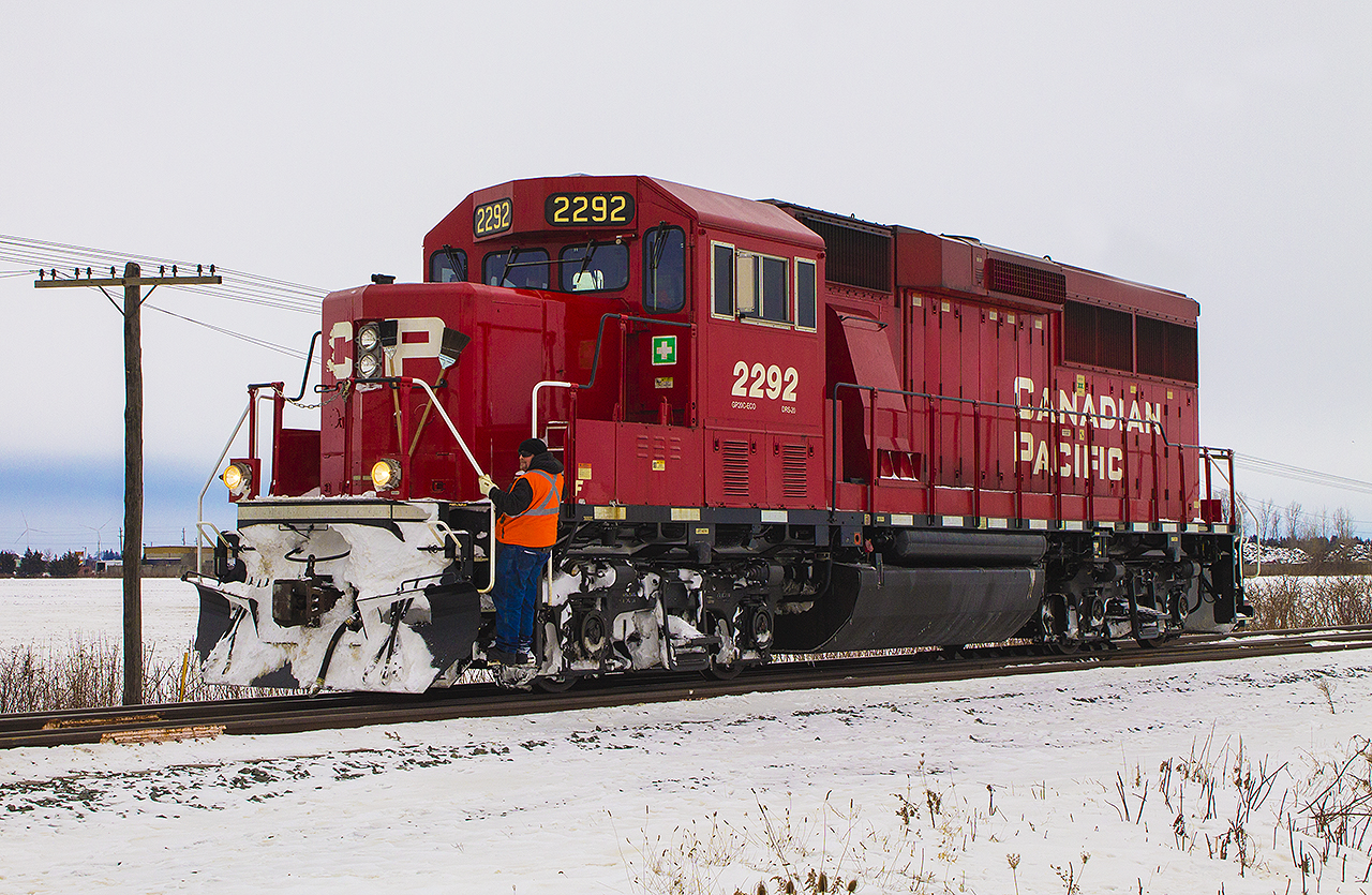 Nearly two years ago, a chilly reminder of a hardworking individual who appears to have no weakness to the harsh climates of winter in Southwestern Ontario. Here, 2292 finishes switching and looks extraordinarily colourful against the cold white surroundings as the windchill this day sure felt mightily frigid.