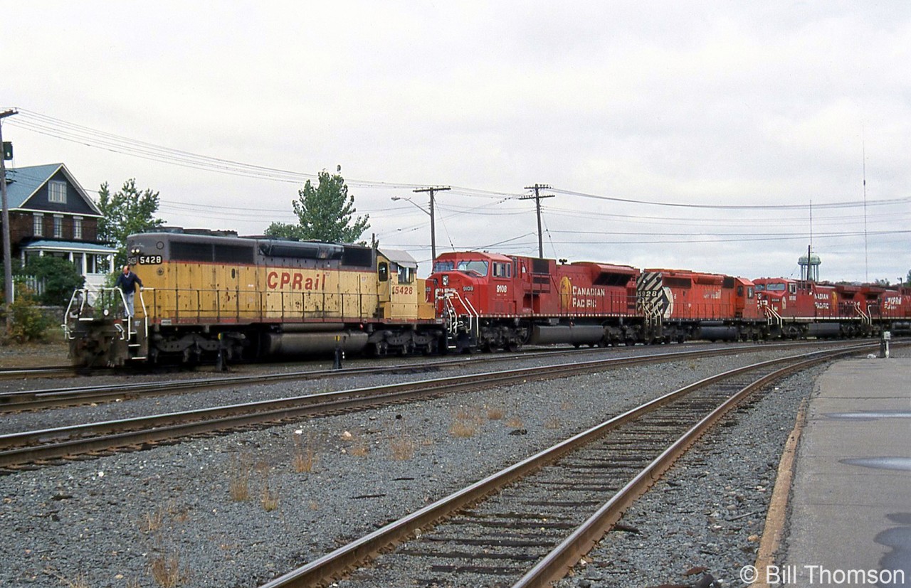 A set of power including CP SD40-2 5428, SD9043MAC 9108, SD40-2 5928 and two other GE AC4400CW units move around near the station at Sudbury. CP 5428 is a former Missouri Pacific/Union Pacific unit CP had purchased secondhand from GATX (after having leased it through them). The 5400-series were CP's secondhand SD40 number series, which included units originally built for railroads including MP/UP, KCS, QNS&L and NS/SOU.