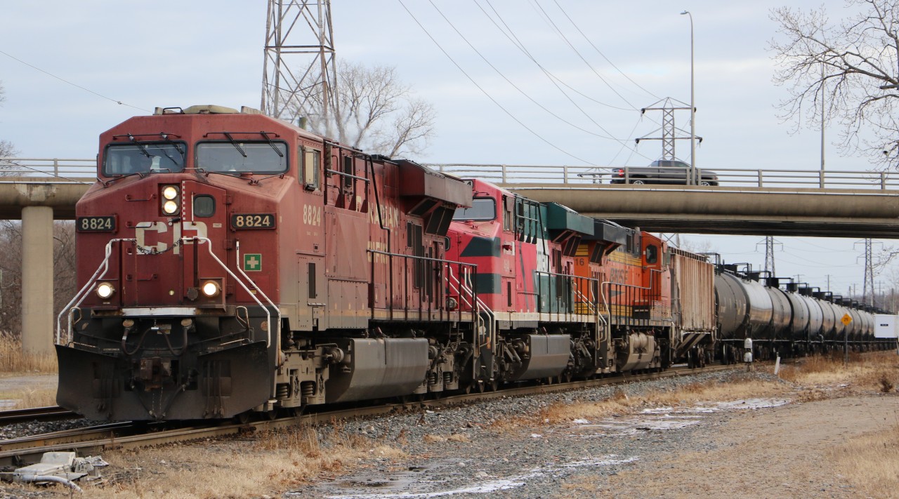 CP 651 is westbound in Windsor, Ont with a colorful lashup. This train was in a 3x1 configuration, not very often you see a DPU on an empty westbound.