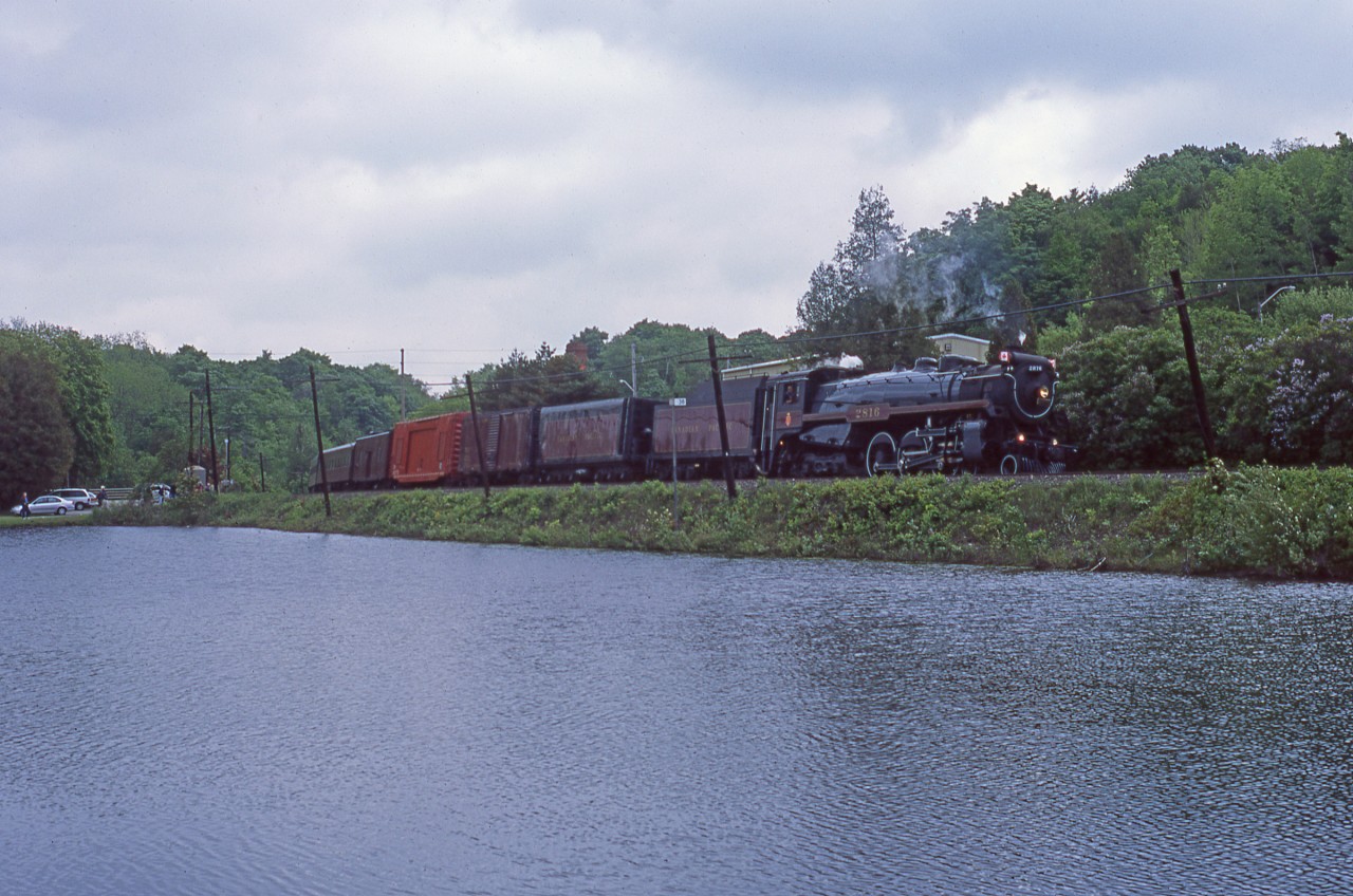 In this scene an unassisted CP 2816 is almost at the top of Campbellville hill and was sounding amazing in the process. The train would make a service stop at Guelph Junction then head down to Hamilton.