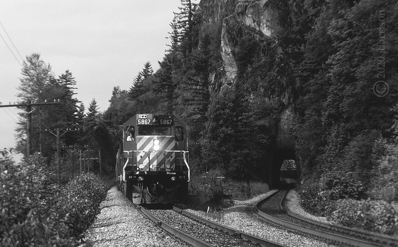 CP 5867, headed east and just out of the tunnel. The train will pass through Agassiz next as it heads for the Fraser Canyon and beyond.