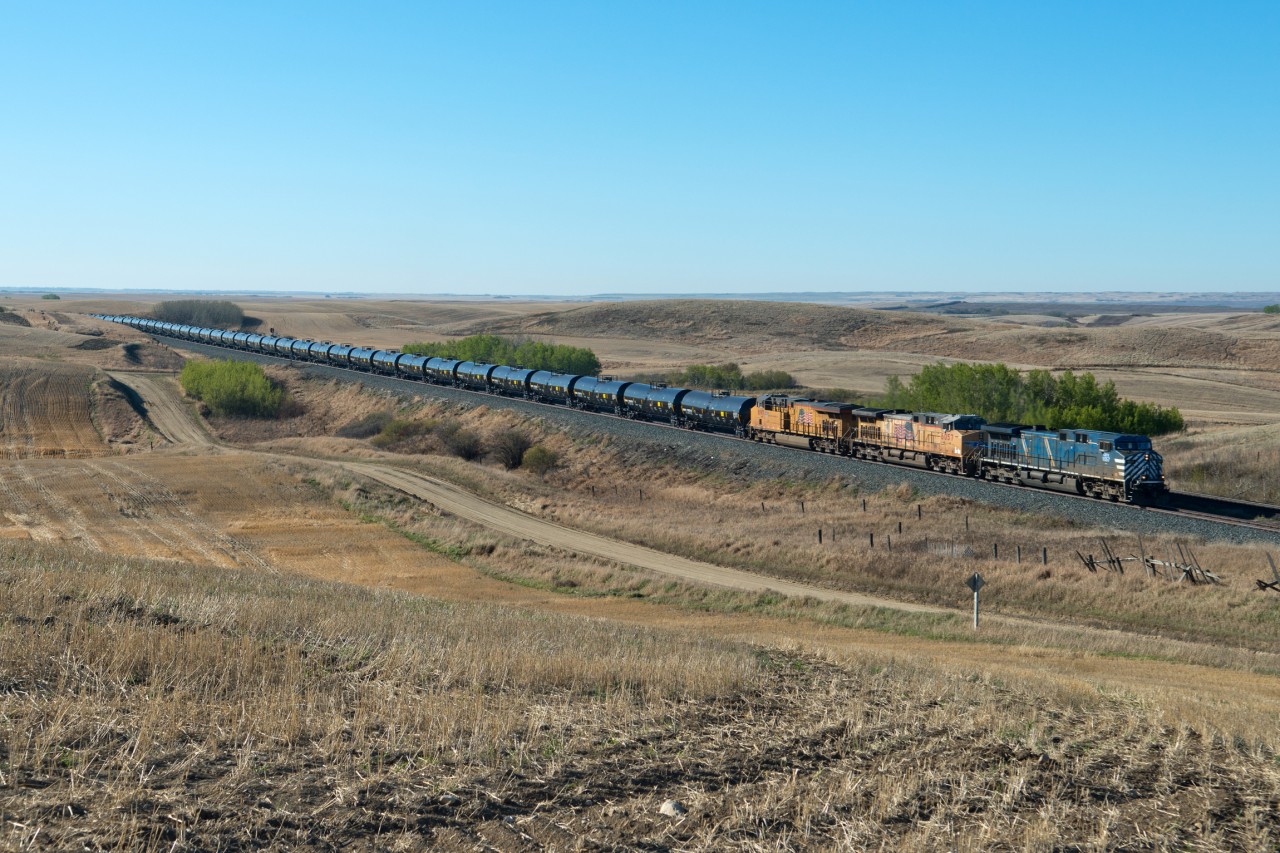 An early morning CP westbound works it's way through the ghost town of Keppel Saskatchewan. I always like a CP train with no CP power.