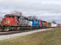 For a few days following the CN conductor strike, CN L580 out of Brantford ran with a power set of CN 5273, GMTX 2277, CN 9416.  On an extra Saturday run, we see L580 arriving in Hagersville with the SD40-2W in the lead.  I was glad to have this opportunity to shoot 5273 leading as within the week the power was shuffled to have the SD40-2 in the middle and a GEVO was added.