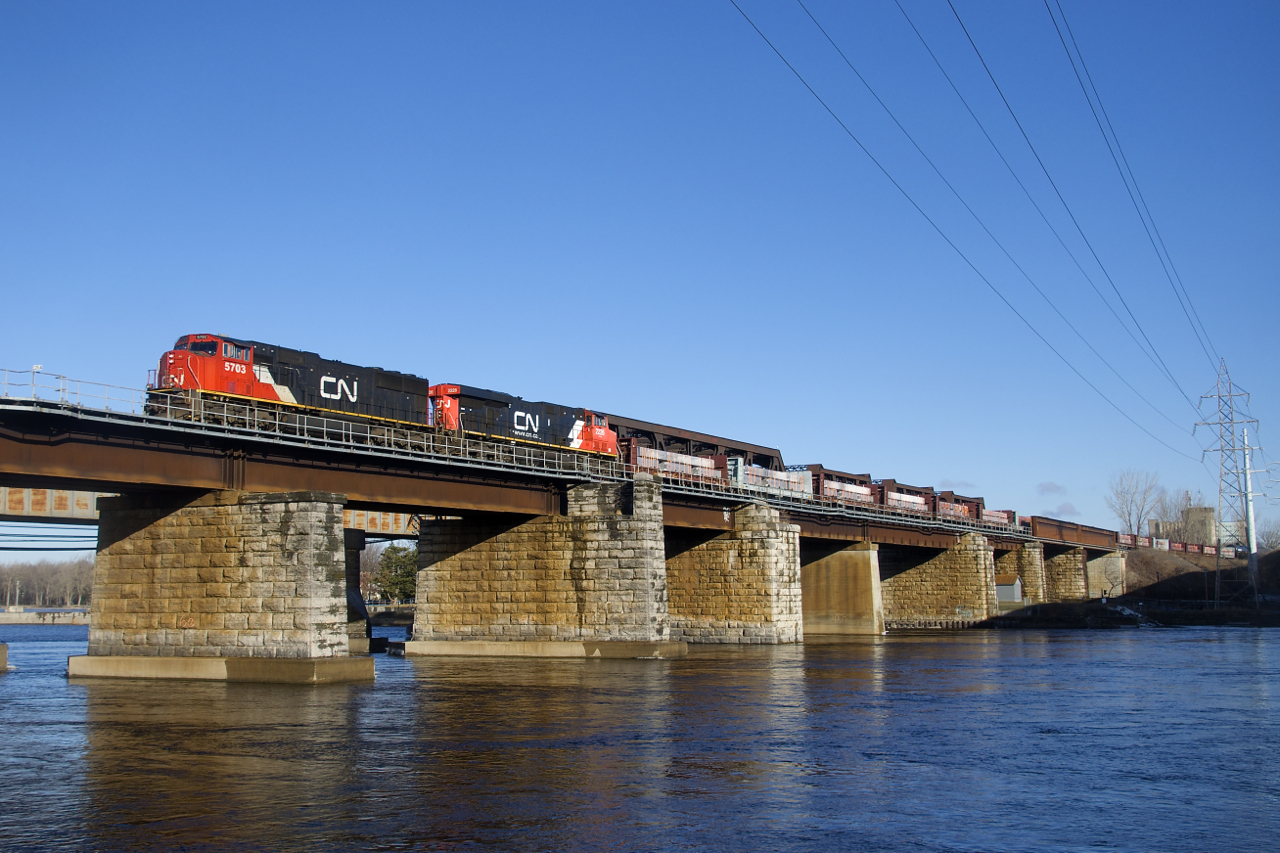 CN 5703 & CN 2226 lead CN 369 over the Ottawa River.