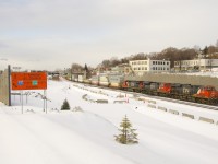 CN 120 with CN, 2849, CN 8859 & CN 2117 up front (and CN 3008 mid-train) as it approaches Turcot Ouest. Where I am standing is roughly where the main line would have been up until a line change a year and a half ago. 