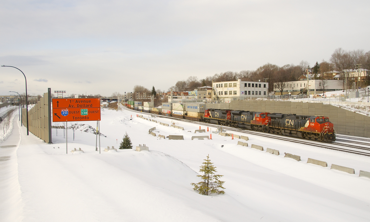 CN 120 with CN, 2849, CN 8859 & CN 2117 up front (and CN 3008 mid-train) as it approaches Turcot Ouest. Where I am standing is roughly where the main line would have been up until a line change a year and a half ago.