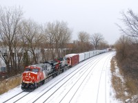 CN 324 with ET44AC's CN 3206 and class leader CN 3000 head east, on their way to St. Albans, Vermont and interchange with the NECR.