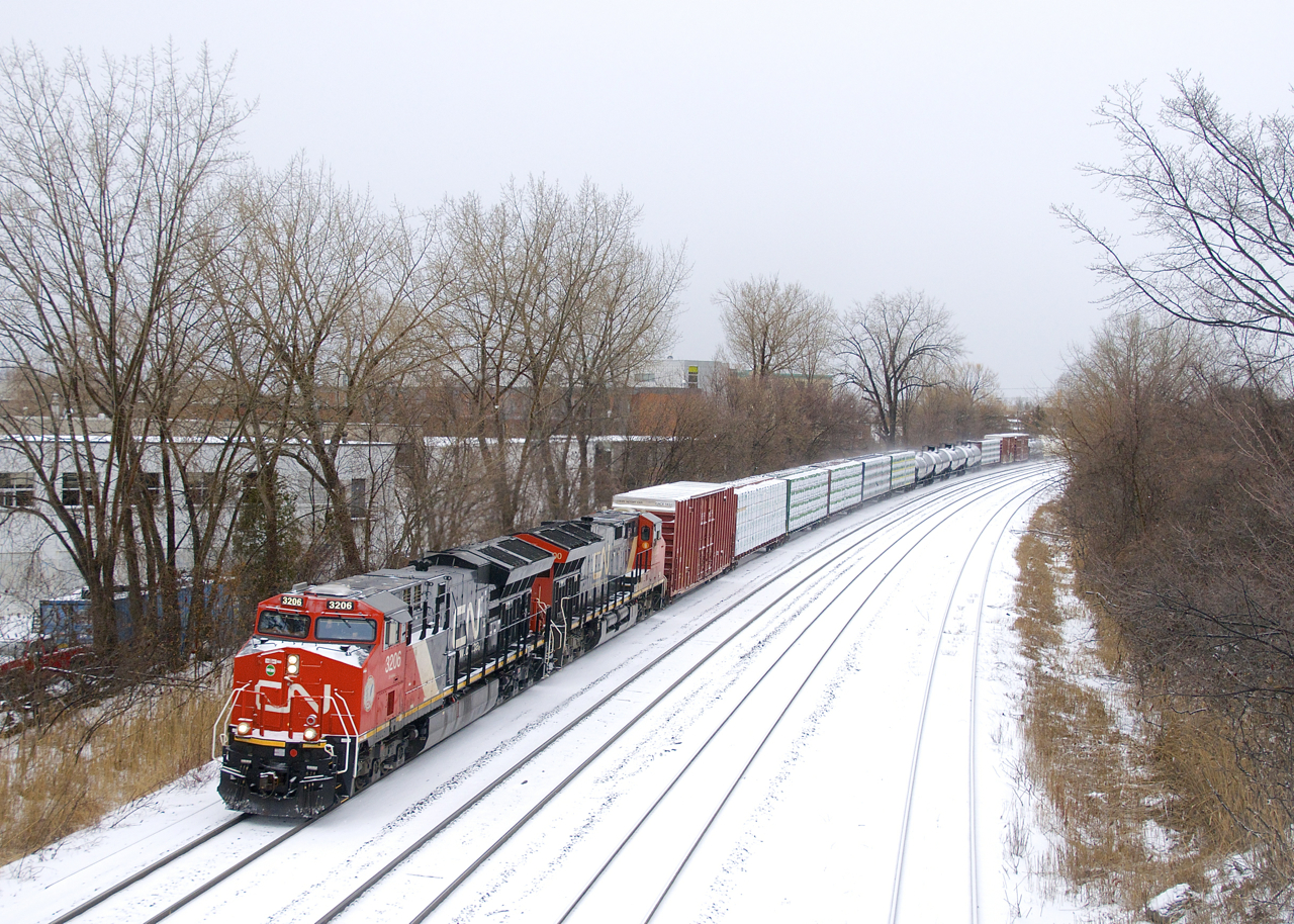 CN 324 with ET44AC's CN 3206 and class leader CN 3000 head east, on their way to St. Albans, Vermont and interchange with the NECR.