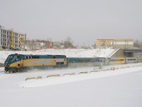 VIA 65 kicks up the freshly fallen snow as it heads towards its next stop at Dorval the (very cold) morning after a snowstorm.