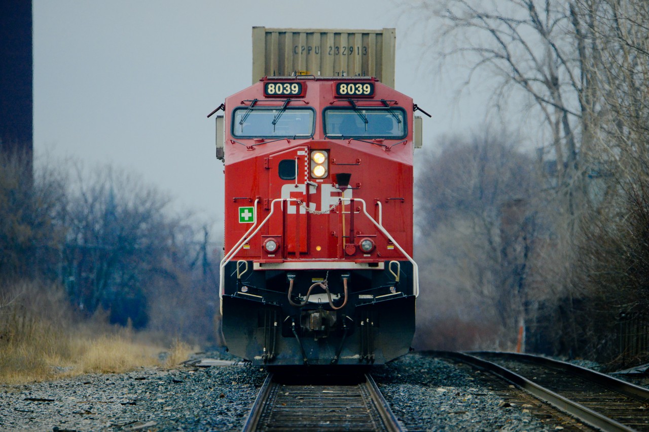 CP 8039 was the tail end power for a westbound manifest train headed through Toronto.