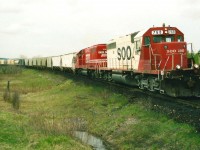 SOO Line 768 and 773 have just departed Woodstock after setting-off a few cars and are seen heading eastbound through Coakley. This train will eventually meet CP 5669 west at the next siding at Blandford.