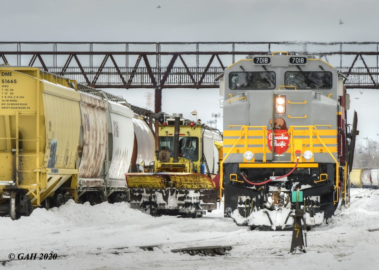 CP 7018 Heritage locomotive, Extra 10.00 o'clock yard ready to take the lead with snow spreader operations in Westfort A-yard in Thunder Bay, Ontario.