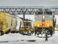 CP 7018 Heritage locomotive, Extra 10.00 o'clock yard ready to take the lead with snow spreader operations in Westfort A-yard in Thunder Bay, Ontario. 