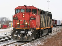 Twenty years prior, a report of a single CN Dash 8-40CM lugging 431 across the Guelph Subdivision would have set the railfan community abuzz....flash forward two decades later it actually still did. While technology, with the internet and cell phones and text messages are now able to give fans plenty of warning, the CN Dash 8-40CM's find themselves on the other end of the technological spectrum as they log their last miles facing somewhat of an uncertain future. Here, X431 has been led into Kitchener with 2427 making easy work of the Guelph Subdivision with a long train of hoppers it has just uncoupled from. 

Additional notes from the day..

During the night of February 10, 2018, CN A431 with 9675 and 9482 had a long and heavy train when it departed MacMillan yard in Toronto. Once on the Guelph Subdivision, the Niagara Escarpment grade proved too powerful for the two four-axle units. The train retreated back to (Silver) Georgetown and set-off the majority of its Stratford cars before trying another run at the grade. Eventually the units made it over and then go on to set-off 39 cars in Guelph before finally arriving in Kitchener after sunrise. The train then tied-down in Kitchener and CN would order an X431 to lift the cars left on the Halton Subdivision by A431 and bring them the remaining distance to Kitchener. 
