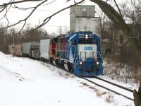 CN L568 with GMTX 2255 and CN 4761 are seen at Queen Street on the Huron Park Spur and are heading to the interchange with Canadian Pacific. The train also switched Ampacet Canada Corporation after setting-off their cars for CP.


