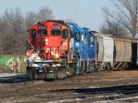 CN train L568 with GP9RM 4028, GMTX 2323 and GMTX 2279 are building their train in the Kitchener yard. All of the cars were later set-off at Stratford for the Goderich-Exeter Railway. 