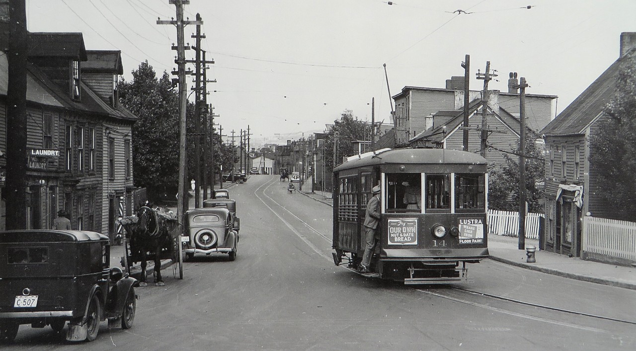 BIRNEY ON BUSINESS. Many may not know that the City of St. John's hosted the most easterly street railway on the entire continent from 1900 to 1948. While visiting St. John's for the Royal Visit of June 1939, the late Thomas Harvey of Grand Falls was able to capture some beautiful images of the Newfoundland Light & Power Company's narrow gauge Birney cars in action. Here a dapper gentleman boards # 14 near the end of the line at the Crossroads on Water Street West. Note the automobiles on the left side, at the time Newfoundland still observed the British rule of the road which wound not change until January 2nd of 1947. This image - credited to the collection of his son, Dr. Neil Harvey - and dozens of others can be seen in my latest release STREETCARS OF ST. JOHN'S in a 'then & now' format.
