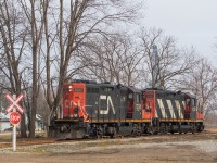 CN 514, with 7038 and 4130, has made the decent into Agris in Thamesville to lift two empties. It's quite the grade down off the Chatham Sub, and you can see the switch stand to the right of 4130. I'd also shot <a href="http://www.railpictures.ca/?attachment_id=37006" target="_blank">4777 on the grade itself</a>, back in May 2018. This particular 514 did not go to Blenheim, and also did not take any loads to Thamesville. Because their only work required using the north track on the Chatham Sub in Thamesville, it took them more than two hours to even move in Chatham. They're ordered for 0800, but didn't get moving until after 1000 on account of the two VIAs that come through Chatham on the Chatham Sub. Compounding my impression of the lack of a productive day, this train ran for the express purpose of lifting the two empties from Thamesville. After they lifted the empties, they pulled them across to the east side of Victoria Road (County Road 21), where they ran around the train for the return trip to Chatham. That was the extent of the day.

I'd long just assumed this vantage of 514 coming into Agris was private property - part of the Agris facility itself - so I had never shot here before. It turns out that it's actually a public road - Railway Line. Pays to go down the Google Maps rabbit hole sometimes.