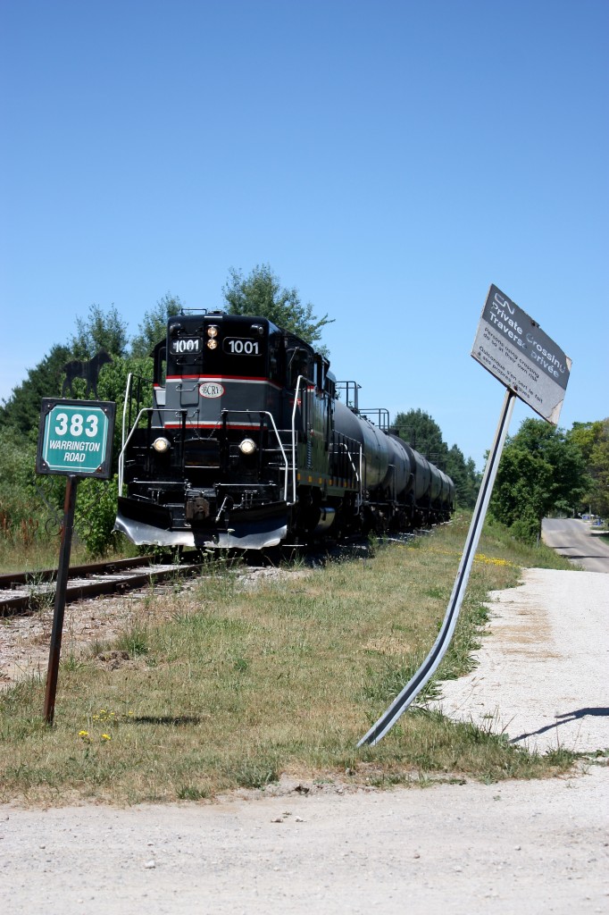 It's hard to believe it has almost been a decade since the very last Barrie Collingwood train ran out of Collingwood. It was a good chase this day and the only time I ever railfanned the line. The old CN private crossing sign seen here tells the tale of the history of the line and sadly this will most likely be the last train to travel over the line that was once so important to the towns along the line. Today the line is heavily overgrown with a few sections and crossings removed.