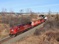 I was in Burlington when I got a nice tip from a friend that CP 8008 was leading CP 246 so over to Newman Road I went. A few minutes later I got another saying an SD40-2 was along for the ride. Well, in perfect sunshine for a change, out from under the Highway six bridge comes CP 8008 with CP 6051 and CP 8131 heading down the Hamilton sub on their way for work at Kinnear Yard.