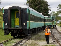 Our first time on the PSTR was very memorable. Only cause this day was the last train for the day that we were going to ride on. Its also a very popular line with rail enthusiasts from all over. This was evident by the other photographers and videographers alike (that were just out of frame). Here, the previous train was returning from it's run up to Whyte's. A couple of familiar faces to the rail community were working this day...including the conductor who was in communication with the engineer working the throttle to ease into the siding. 